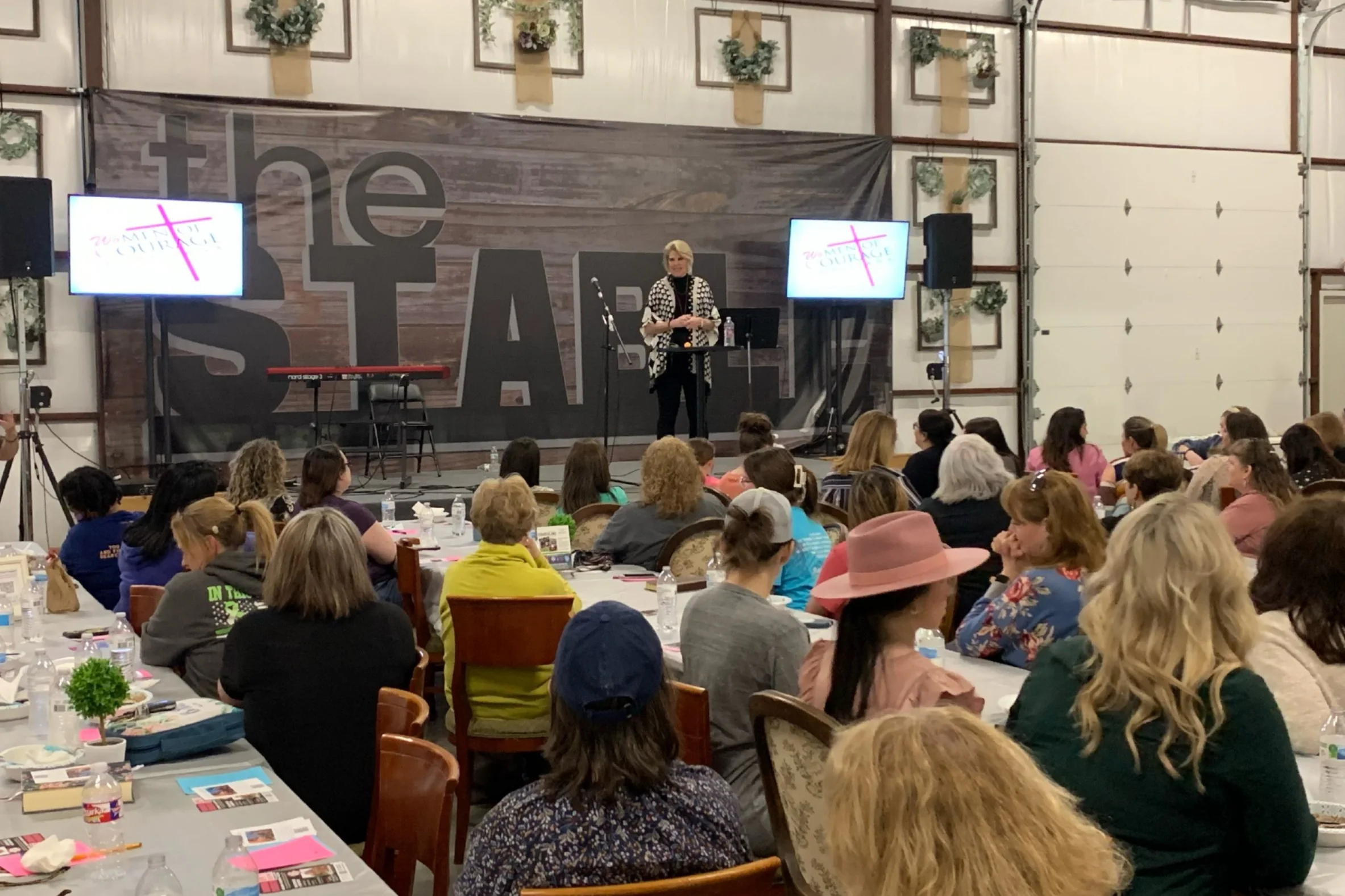 Gayla Speaking On Stage